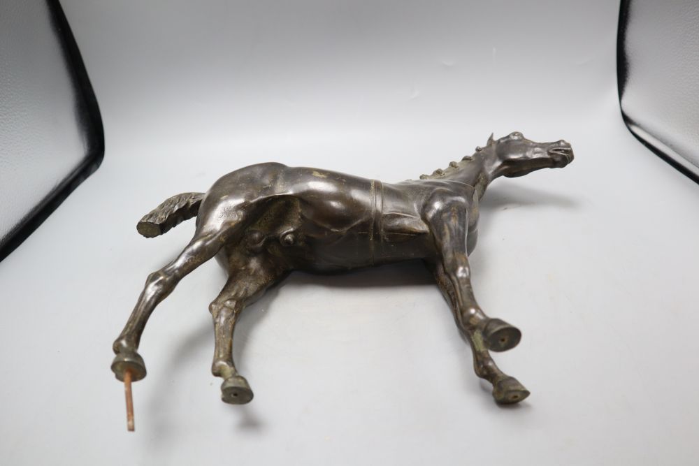 A late 19th/early 20th century bronze figure of a horse, height 30cm, lacking base